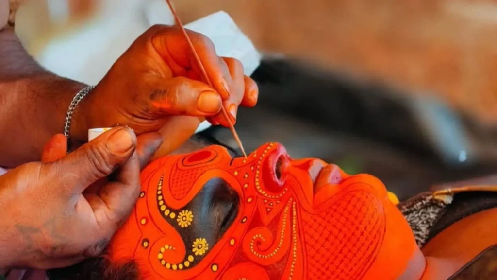 theyyam face painting or mugathezhuthu